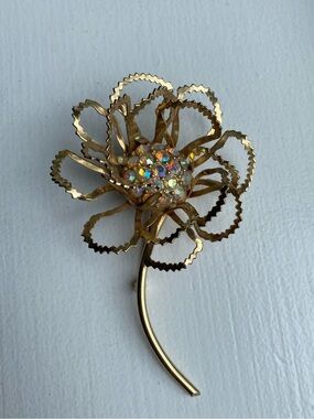 Sarah Coventry Gold Flower Brooch with Aurora Borealis Rhinestones